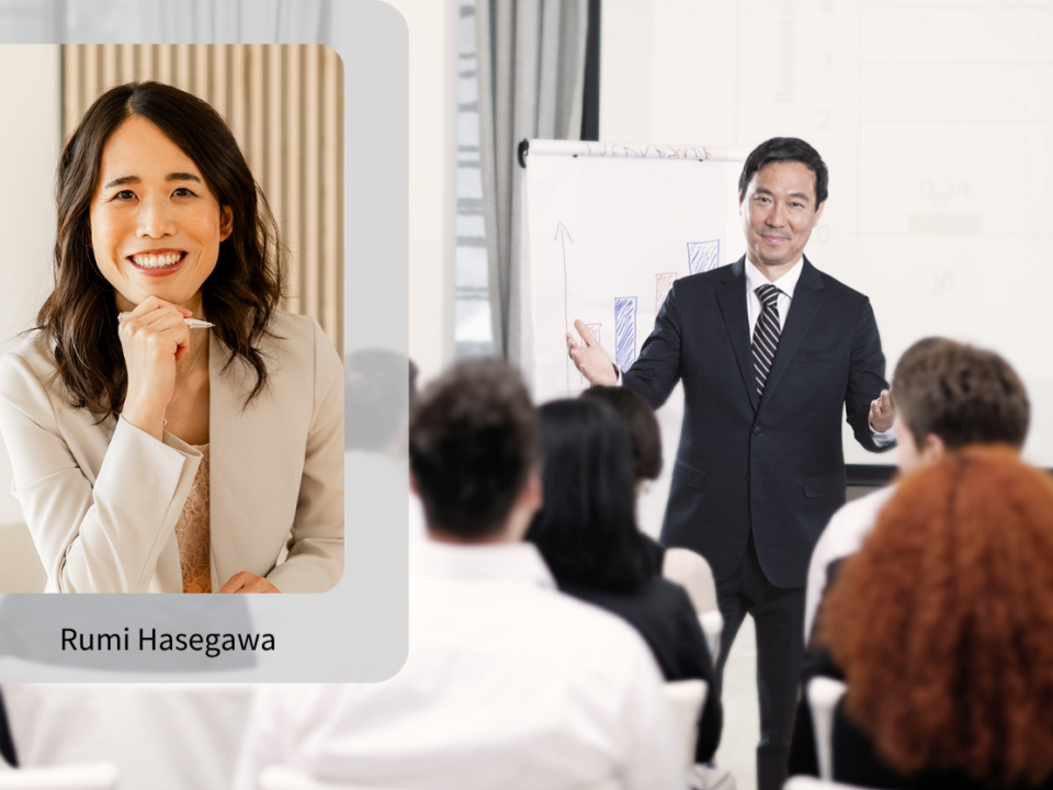 Rumi Hasegawa, asian colleague in front of the Team