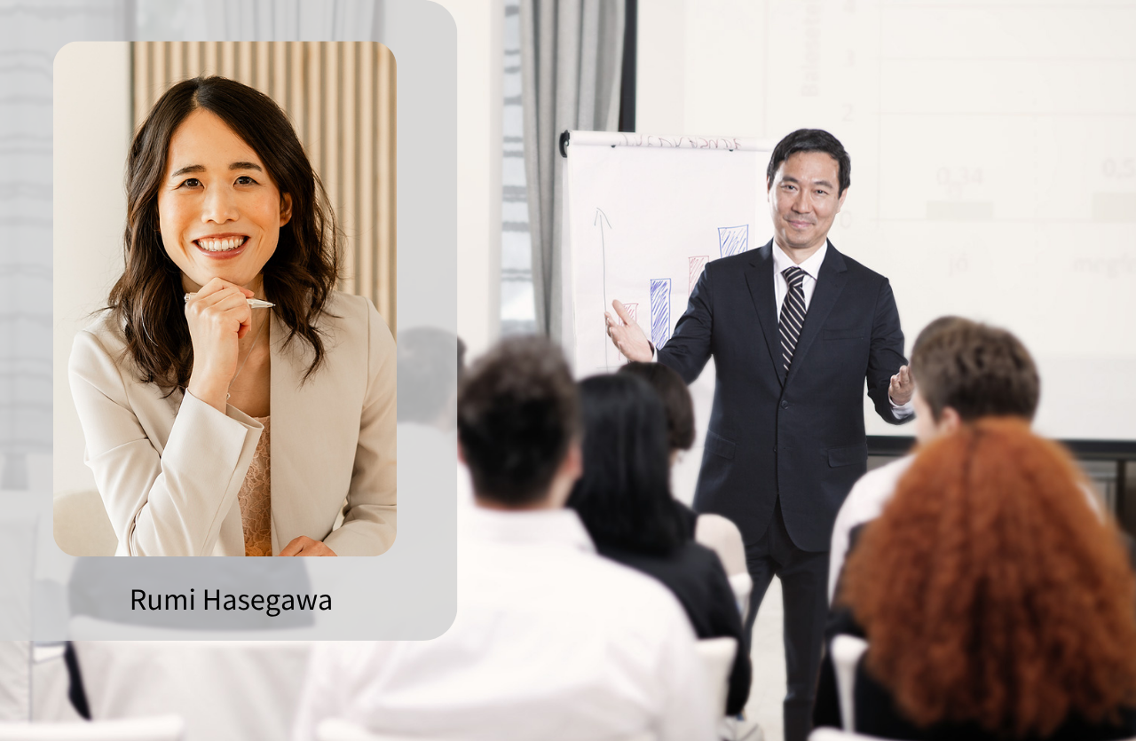 Rumi Hasegawa, asian colleague in front of the Team